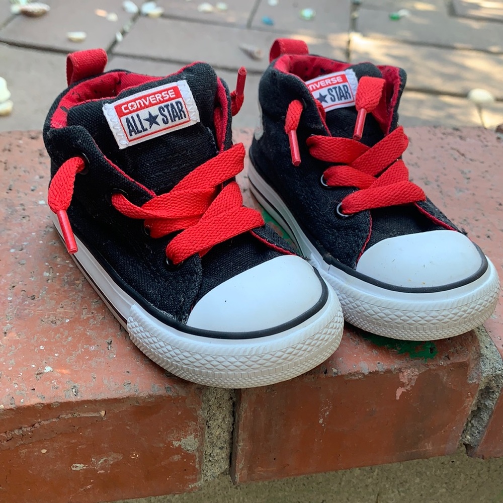 Toddler size 6 black/red converse. Used gently.